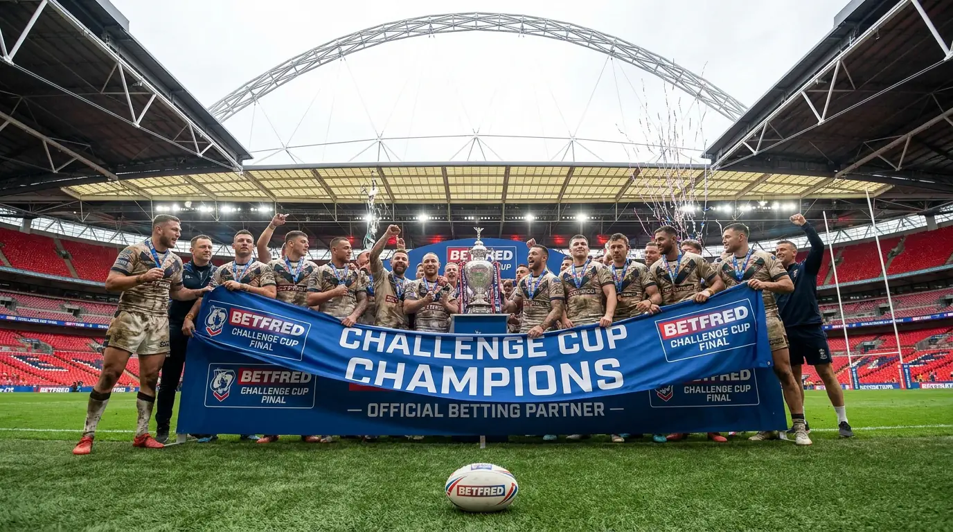 Rugby league cup final team photo with trophy on Wembley pitch