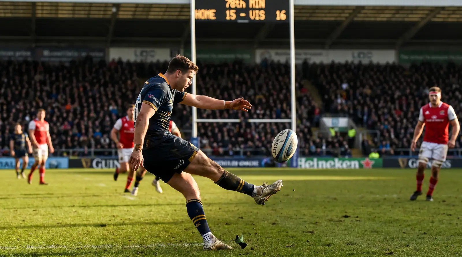 Rugby fly-half striking a drop goal under late-game pressure