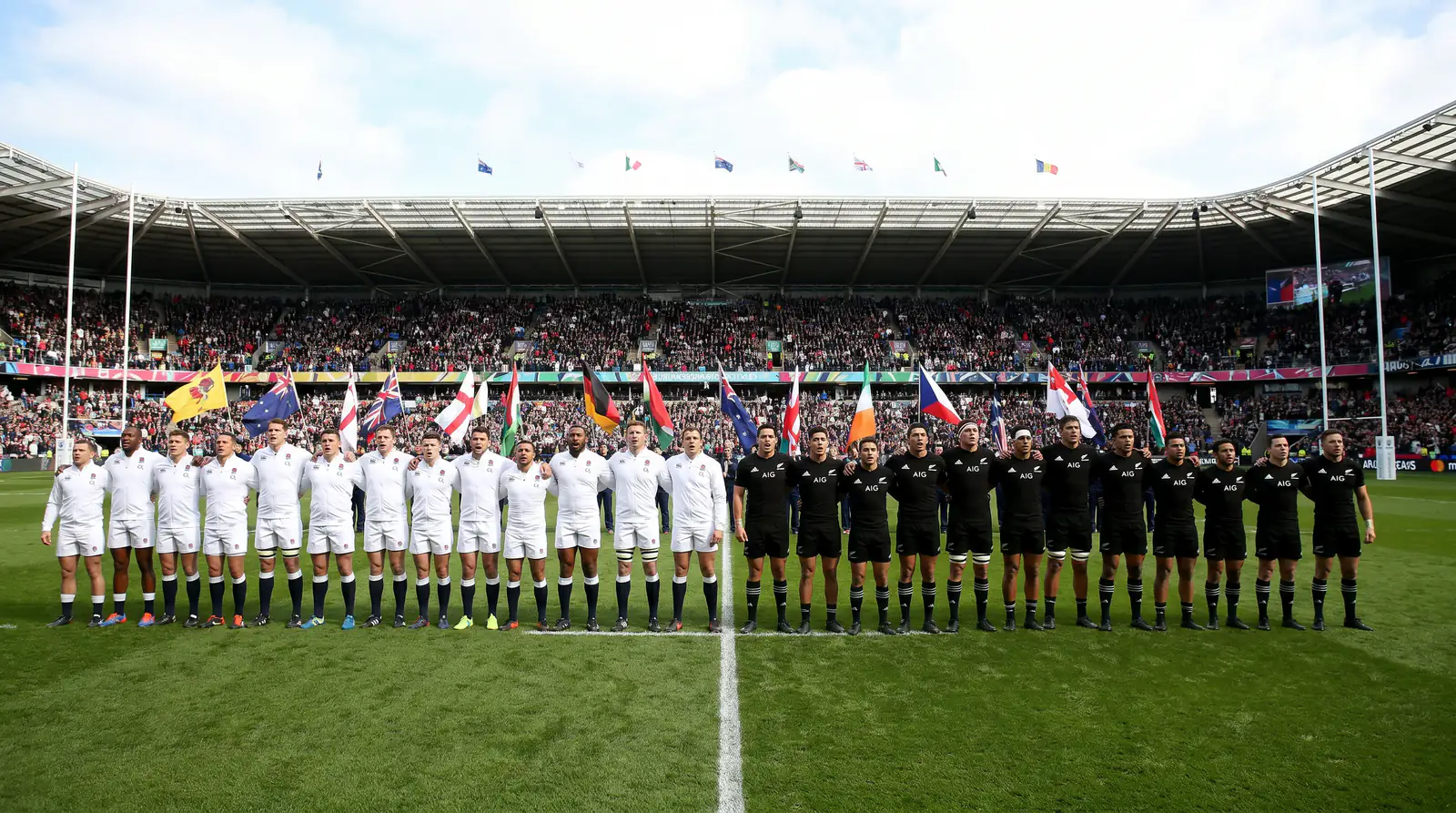 Two rugby union international teams lined up for national anthems before a World Cup knockout fixture