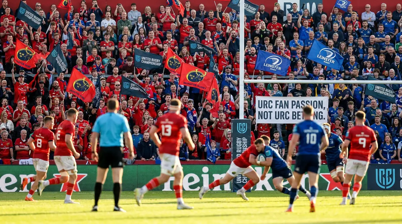 URC home supporters waving flags in stadium stand during match